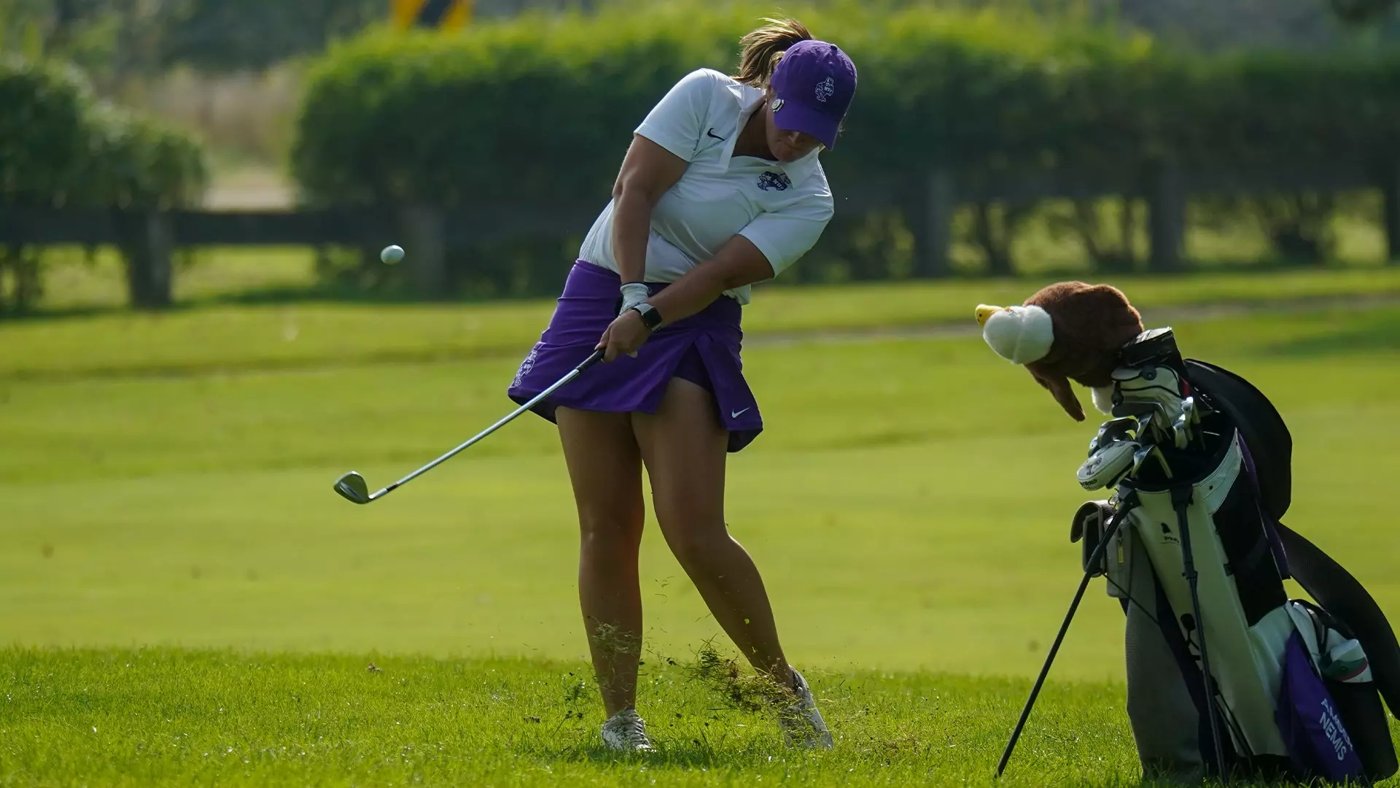 Niagara women’s golfer Amber Nemis playing a shot on the course